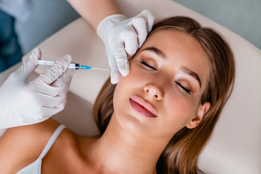 Young woman gets beauty facial injections in salon | Kay Dermatology in Burbank, CA