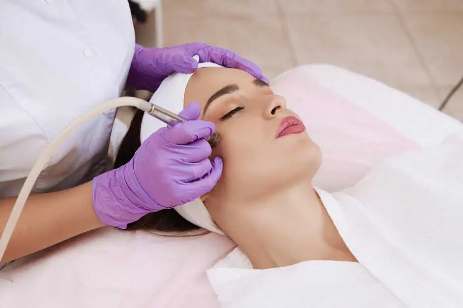 Patient Receiving Microdermabrasion Treatment at Kay Dermatology